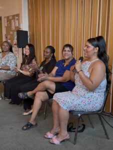 Lisa speaking at Warren Village's Evening of Inspiration alumni event, September 2025.