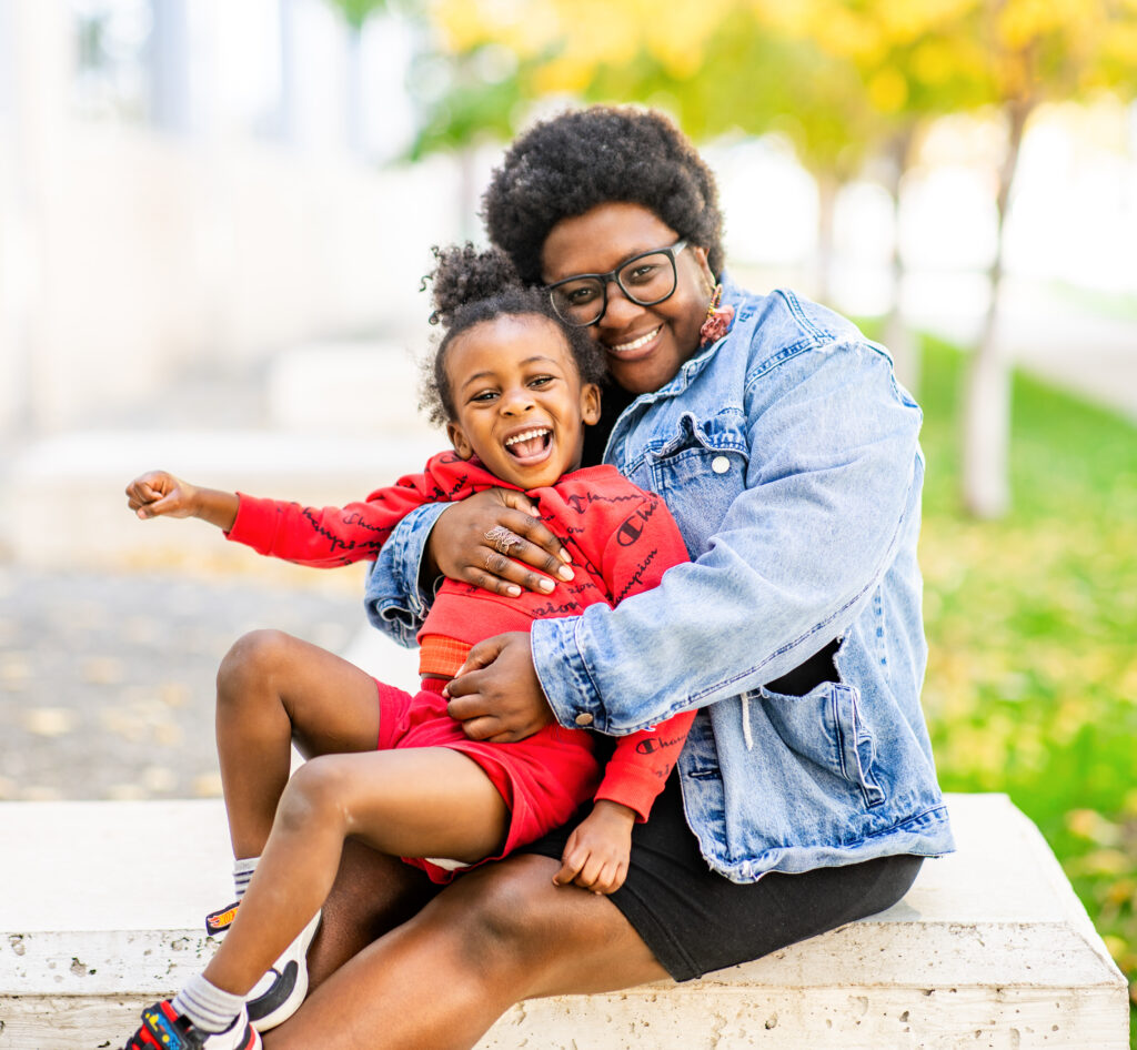 Neema, Warren Village resident, and her son