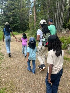 Ruby hiking with her family of eight