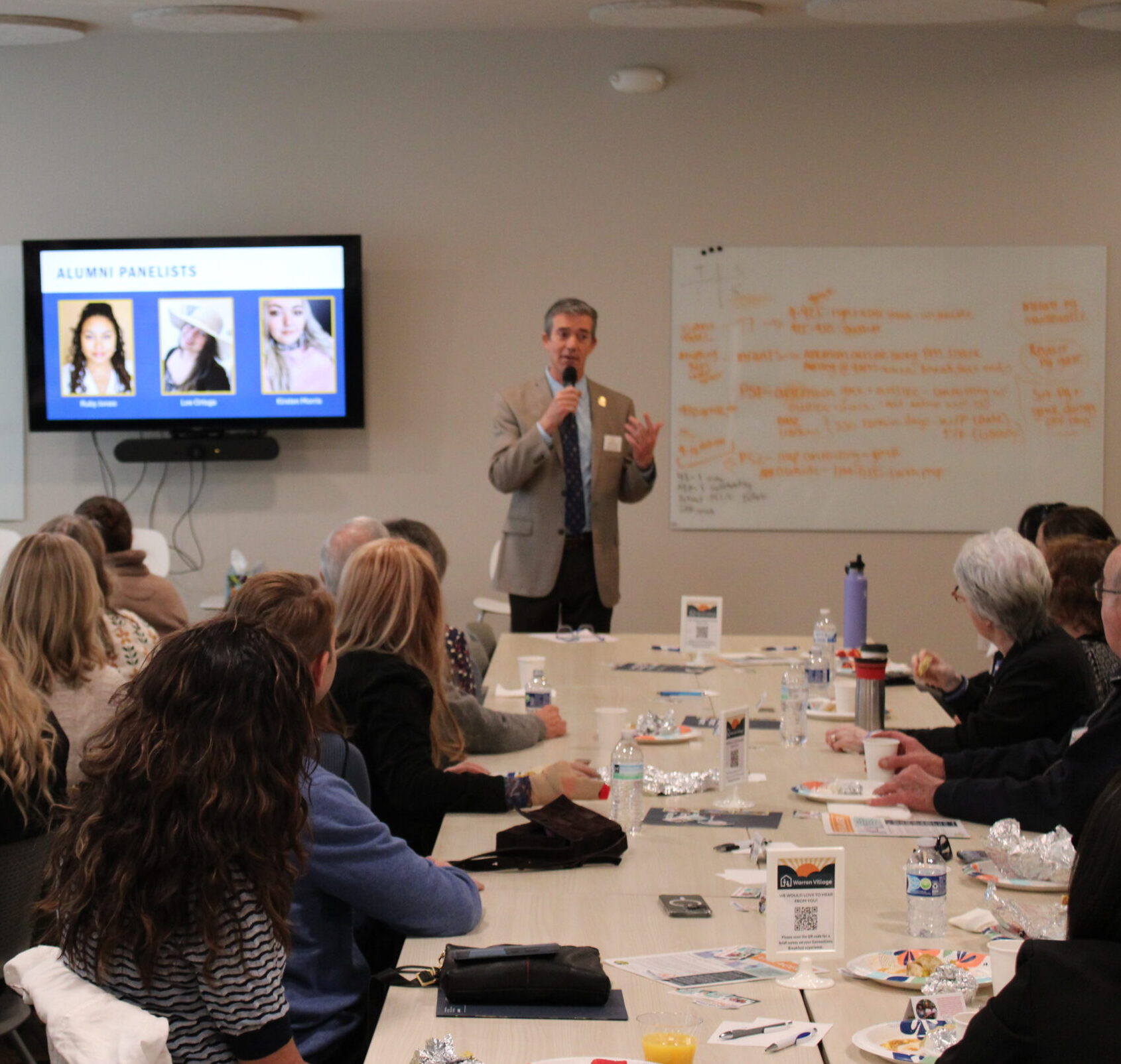 Ethan Hemming speaking at February Connections Breakfast