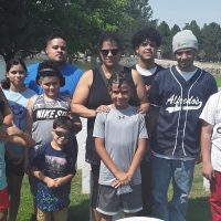 Lisa (center) with her children and grandchildren.